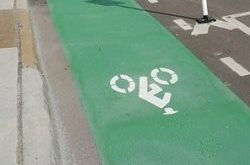 green bike lane on road